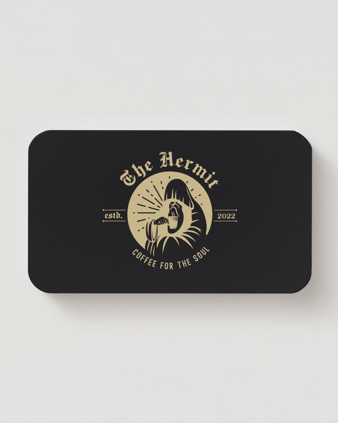 Black rectangular gift card with 'The Hermit Specialty Coffee' logo and text on a white background