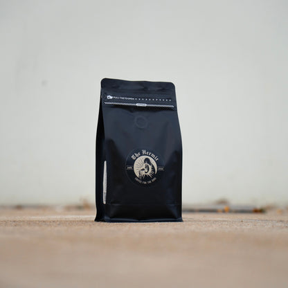 black specialty coffee bag from the hermit